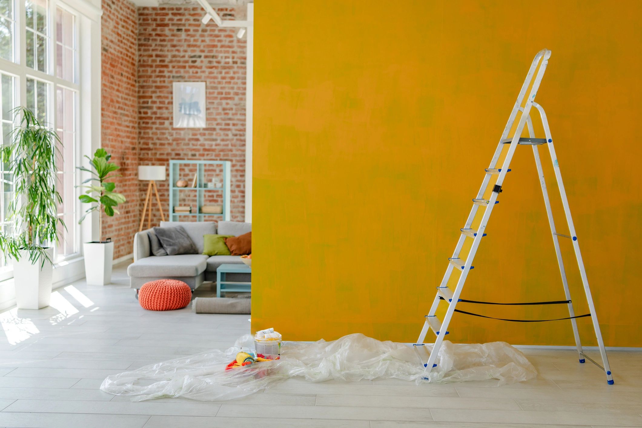 Freshly painted interior wall with ladder